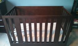 Used, solid wood crib, chocolate brown in colour. Can convert in to a toddler bed (half of the solid back can be removed) and if you can find the rails, can also convert to a double bed.
Comes with a waterproof matress and fitted sheets. Also have some