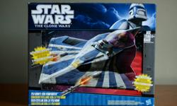 Star Wars - The Clone Wars- Plo Koon's Jedi Starfigter 
*New In Box - Does Not Include Figures*
Retails for $29-35 at Wal*Mart, Zellers and Toys R Us
Features;
2 firing projectile launchers
Droid fits in socket
Figure fits in cockpit
Fighter separates