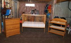 Crib, change table & three drawer dresser in excellent condition.  Only used by one child in smoke and pet free home.  Crib is Storkcraft and includes matress which is also in excellent condition.  All wood - no particule board.