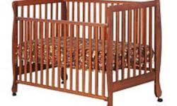 Storkcraft Cynthia Stages 3 in 1 crib . Cognac colour.
Used with two children. Only 4 years old. In excellent condition, from a smoke free  home. Has adjustable heights and a drop side. I also have the drop side conversion kit to make it into a non drop