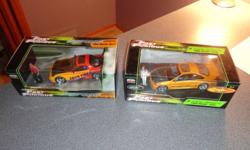 For sale is a lot of 2 Model Cars from the movie "The Fast and the Furious".  They are mint in their original boxes.  The boxes are in excellent condition and have never been opened.  The model cars are 1:24 scale and come with small figurines.  The cars