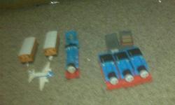 Thomas and Friends Trains and alot of tracks also comes with an airport and some trees and other accompaniments. There are 4 Thomas trains(batt operated) and Gordon, Clarabelle and a few more....ALL for just $20.00