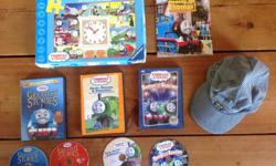 3 DVD's, 1 book, 1 puzzle with moving clock hands (no missing pieces) & Oshkosh engineers hat ( size 4-7).