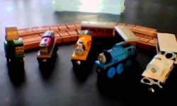 All are authentic Thomas & Friends Wooden Railway items. Excellent condition.
Trains include: Thomas the Tank Engine, Annie and Clarabel,(two of his coaches), light up Proteus, Salty, Milk Barrel car with milk barrel, "talking Cow Car' moo's when door is