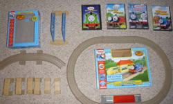 Comes from smoke free home.
 Gently used , excellent condition. Perfect starter for the child who loves Thomas, all trains are battery operated and can buy more sets to expand (at Walmart).
Dvd's:
Best of Percy
James Goes Buzz Buzz
Tales From The Track