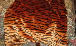 Its a Tiger Sleeping Bag. Used as decoration in an animal themed nursery. From a pet & smoke free home.