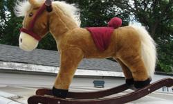 plush covered hobby/rocking horse -15" high at seat-24" long-small child size
good condition