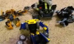 I have bumble bee, ironhide with turret, ratchet hummer. Buy 2 get the twin and mini optimus prime free. $20 for everything. wolverine is sold. bumble bee pic not shown. every transformer is from episode 2