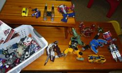 A whole bunch of Transformers.  A couple come with manuals.  I bought this off Kijiji, but I'm not Transformer-Inclined to figure them out and my son isn't showing any interest.  Now, with all the Christmas stuff, they've gotta go.
$30 obo