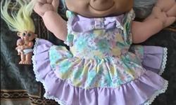 Great condition, all stitching in place. Soft bodied doll and a mini troll.