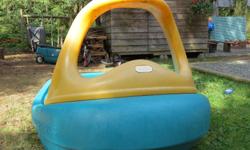 This is a well used pool/sandbox Tugboat. It has a small crack which has been repaired with duct tape (is there anything it won't fix?), the drain hole is plugged and the steering wheel is missing. We're located in Shawnigan Lake.