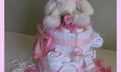 Unique..Adorable & Practical
Baby Gifts
...Everyone will Remember !!
Diaper cakes are one of the most popular gifts for baby showers or as a "Welcome Home Baby Gift"and the reason is quite simple... they are not only adorable and precious, but practical