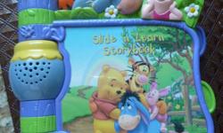 VTech Slide 'N Learn Storybook
Winnie the Pooh
* Eight-page story about Winnie the Pooh and his friends teaches songs and spoken story content
* Interactive pages with sliding, turning and peek-a-boo elements engage baby in play
* Light-up beehive