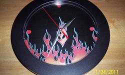 I AM SELLING A WALL CLOCK BLACK WITH FLAMES ON IT. COOL FOR BOYS ROOM, TAKES AA BATTERY
FROM SMOKE FREE HOME
PICK UP ONLY PLEASE, I DO NOT DELIVER OR SHIP
PLEASE VIEW MY OTHER ADS, THANKS