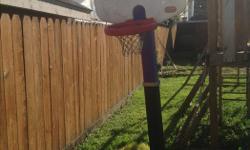 Adjustable, weighted basketball net just fill base with water.