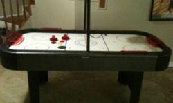 Rarely used and in great condition, an electronic air hockey table. Perfect for Rec rooms, camps, or even for a neighbourhood watering hole!
Comes with paddles, pucks, and goal posts. You can keep score manually or use the electronic scoreboard. Hours of