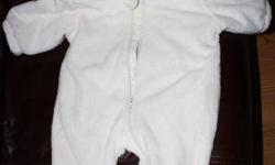 Brand New condition.  No damage or stains.
I purchased this for my son last winter.  Like new condition.
White sherpa pram suit. 
Tag states size 12 months
Clean smoke free home
Located in Byron (West London)
Yes, I still have it.  Ads are deleted