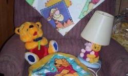 lamp is about 14" high and toy is 11" GANZ , tigger is also on valance and piglet on lamp.....see my garage sale ad.