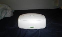 I have a Prince Lionheart wipes warmer. White in color. In great condition, barely used. Refilled it once and stopped using it, I change my baby on my bed so its just easier to use a container plus he's not fussy about it. Most babies don't like the
