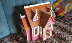 One small wooden doll house fully finished,for 10.00 dollars...337-2127