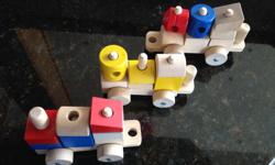 This is a set of wooden toy train blocks. Your little one will spend hours having fun with these blocks.