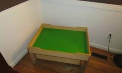 Wooden Train Table with a Green top or flip it over for a white top. This Table also comes with a drawer on wheels for underneath storage.