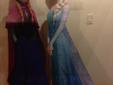 Frozen Anna and Elsa stand