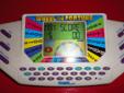 Tiger Wheel of Fortune Game Show Video Electronic Handheld Game